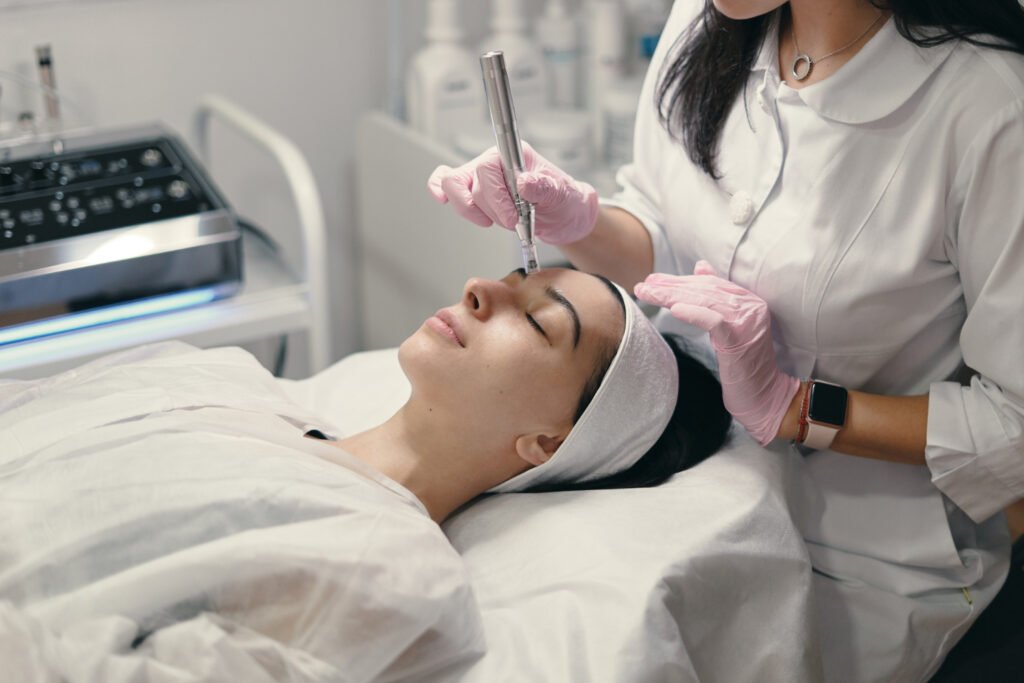 Patient-lying-on-the-table-having-facial-microneedling